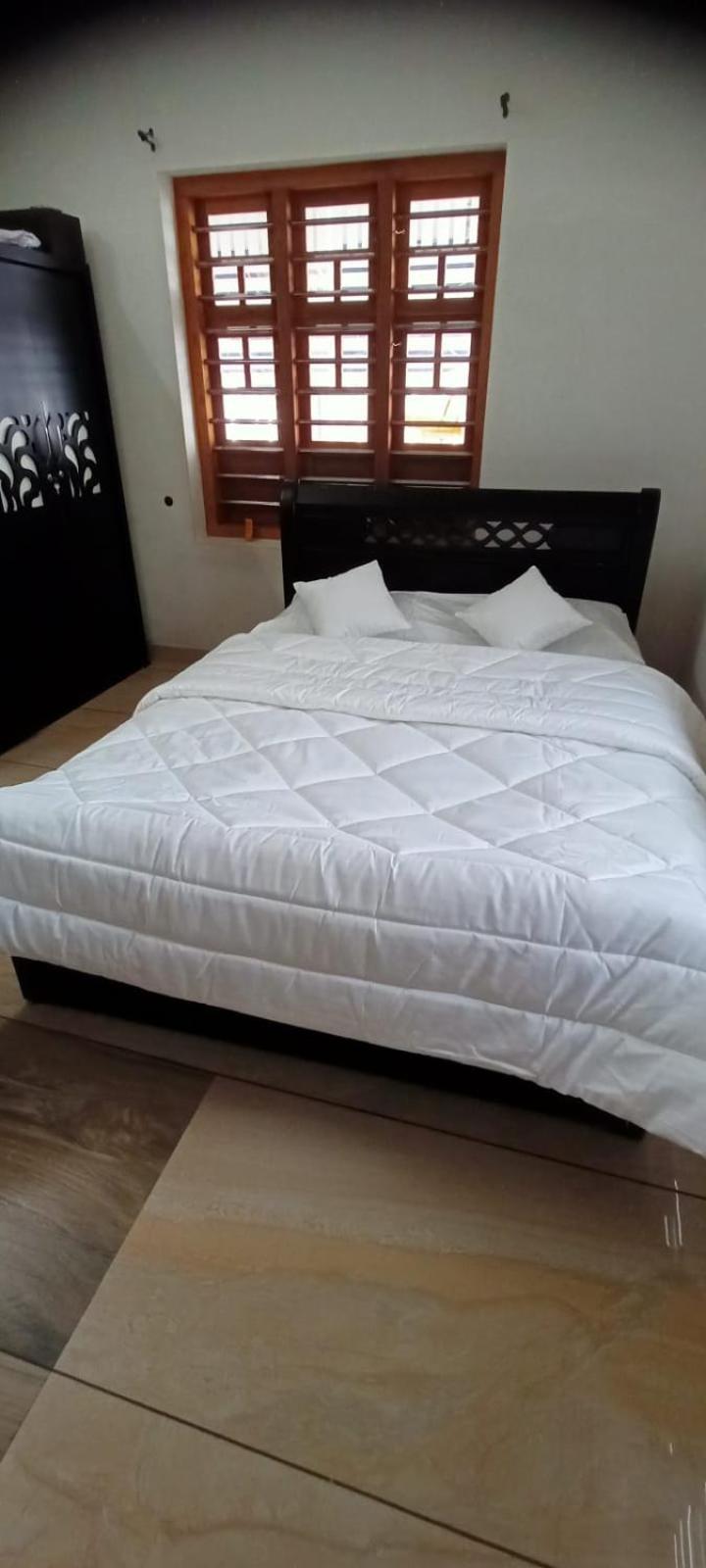 Green Island Homestay Riverside Кожикоде Экстерьер фото