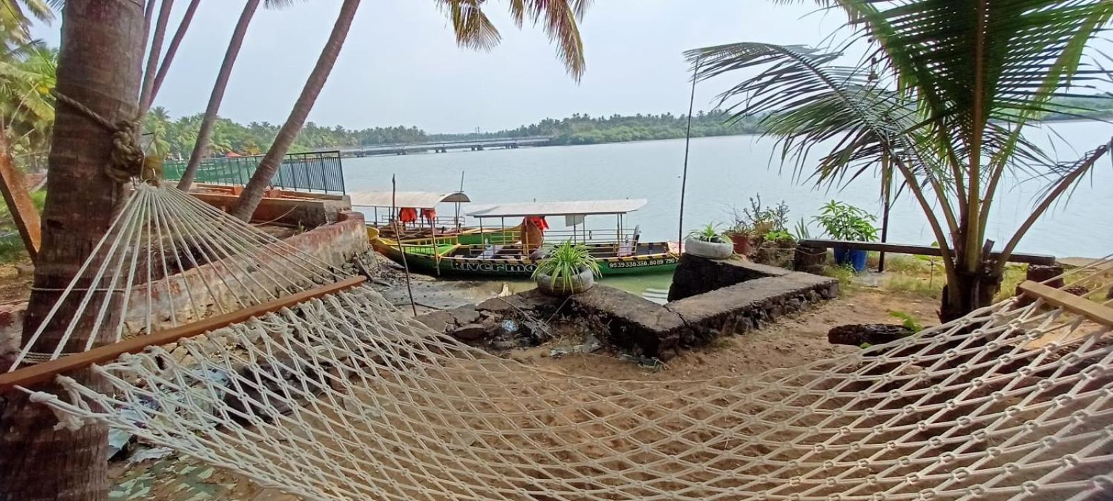 Green Island Homestay Riverside Кожикоде Экстерьер фото